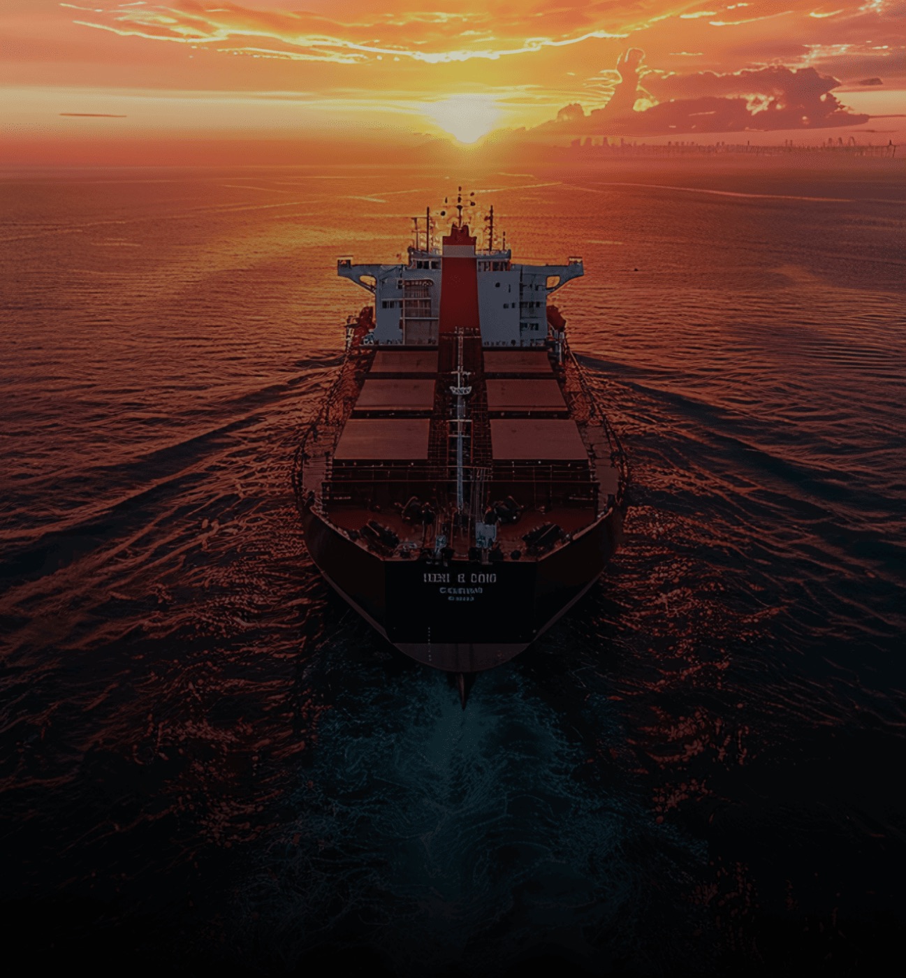 A vessel under way at sunset